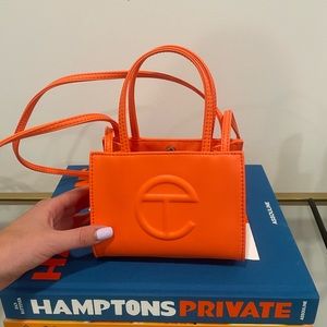 Orange mini telfar bag